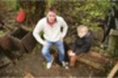 Dorking fathers discover well between gardens